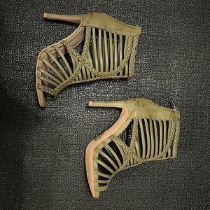 Olive green heel.  Size 7 gently used.